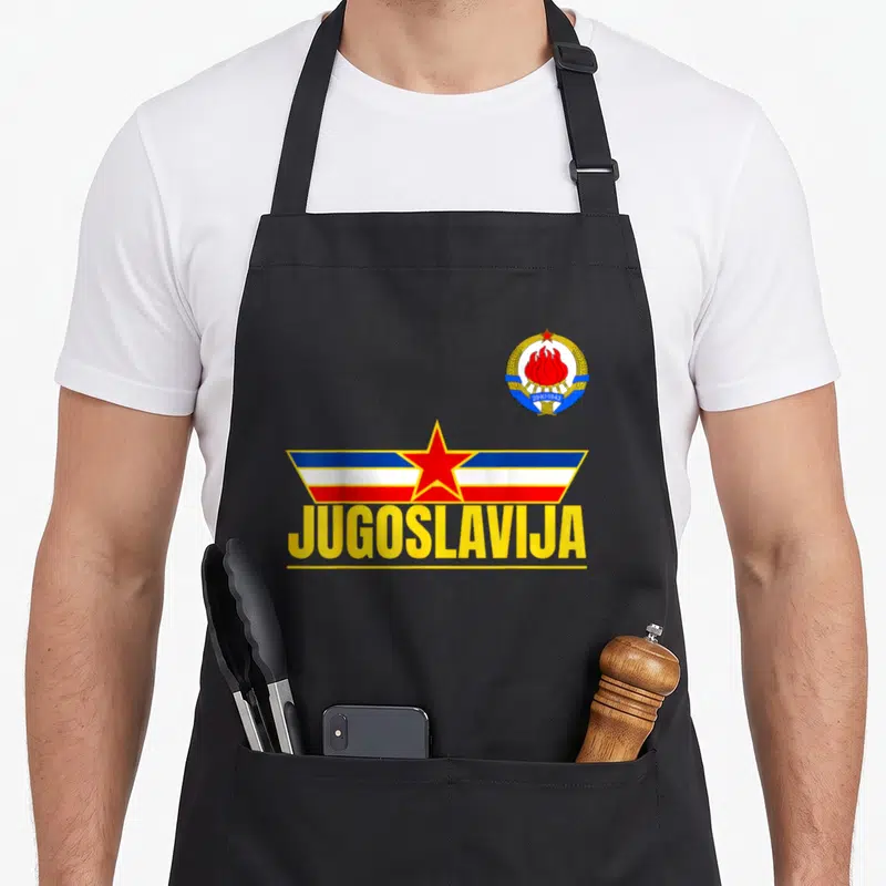 Tablier de cuisine noir avec drapeau Yougoslavie, étoile rouge et inscription JUGOSLAVIJA en lettres jaunes.