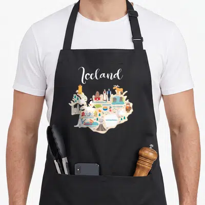 Tablier de cuisine noir avec une carte colorée d'Iceland ornée de Reykjavik et d'animaux typiques.