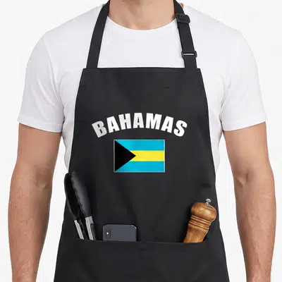 Tablier de cuisine noir avec le drapeau des Bahamas et l'inscription BAHAMAS en lettres blanches arquées.