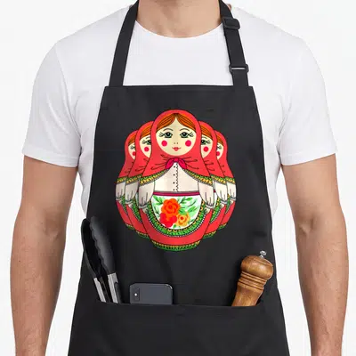 Tablier de cuisine noir avec illustration de poupées Matroshka russes en rangées superposées