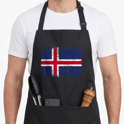 Tablier de cuisine noir avec le drapeau Islande en version dégradée et texturée au centre.