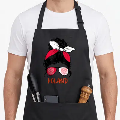 Tablier de cuisine noir avec une illustration de fille aux lunettes à l'aigle polonais et le mot POLAND en orange.