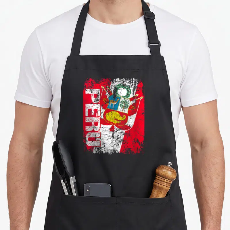Tablier de cuisine noir avec inscription PEROU et drapeau aux armoiries colorées style vintage.