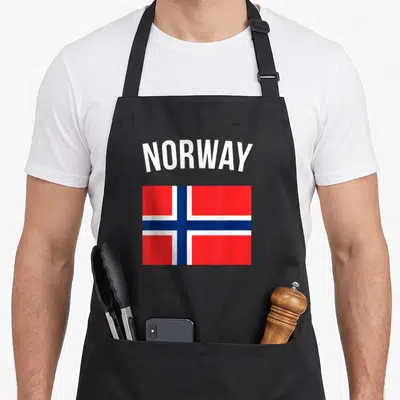 Tablier de cuisine noir avec le mot Norway et le drapeau national de la Norvège imprimé au centre.