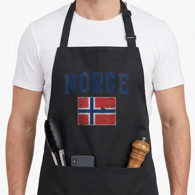 Tablier de cuisine noir avec l'inscription NORGE et le drapeau Norvège à l'aspect vieilli.