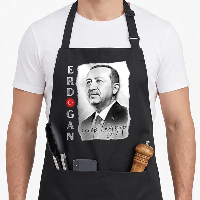 Tablier de cuisine noir avec portrait de Recep Tayyip Erdogan, texte ERDOGAN et logo drapeau turc rouge.