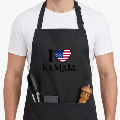 Tablier de cuisine noir avec inscription I Love Kamala Harris et un cœur motif drapeau américain aux couleurs vives.