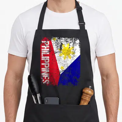 Tablier de cuisine noir avec drapeau Philippines vertical et texte PHILIPPINES en blanc usé.