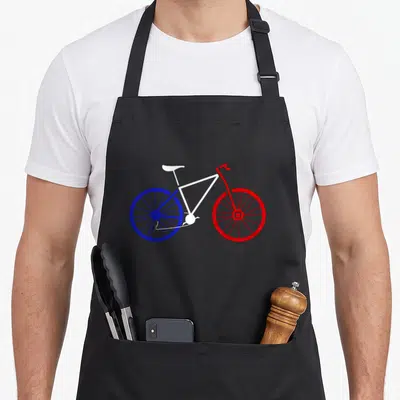 Tablier de cuisine noir avec illustration d'un vélo aux roues bleue et rouge et cadre blanc.