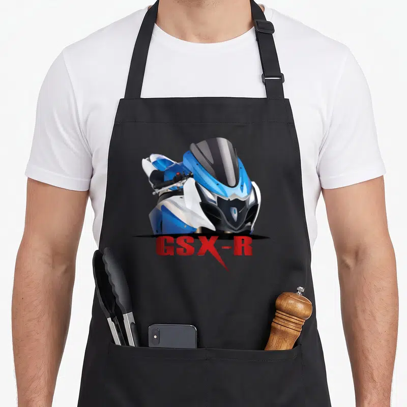 Tablier de cuisine noir avec illustration de moto sport GSX-R bleue et texte rouge GSX-R en dessous.