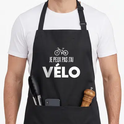 Tablier de cuisine noir avec illustration de vélo et texte blanc Je peux pas j'ai vélo