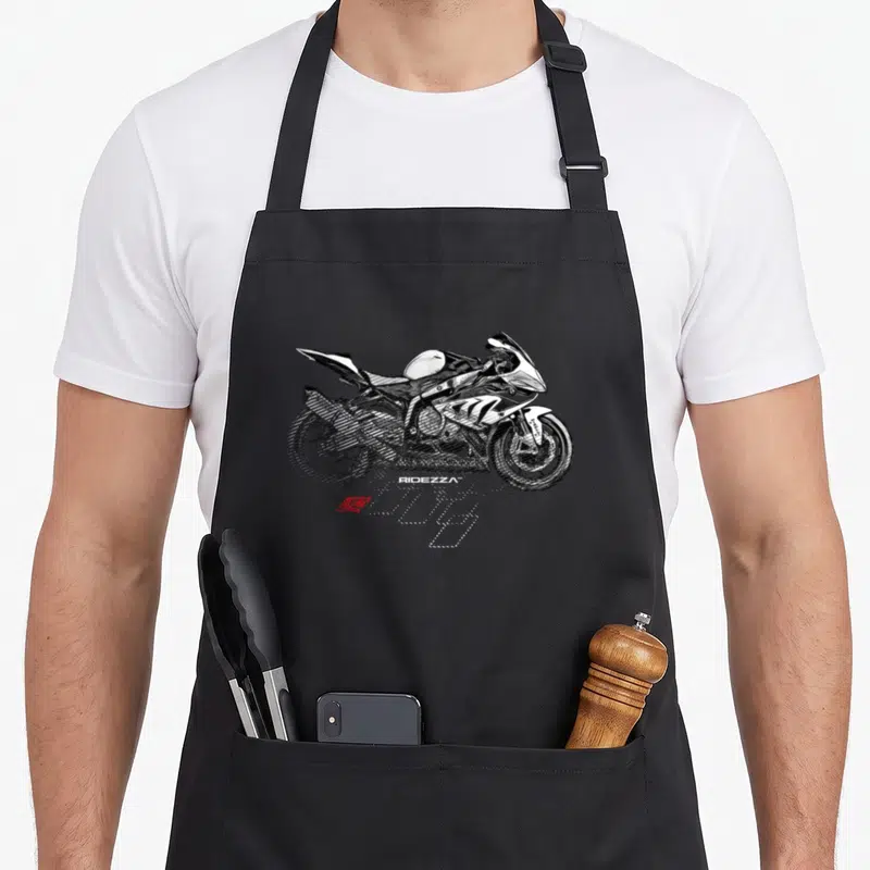 Tablier de cuisine noir avec illustration stylisée d'une moto de course Ridezza SuperGP S1000RR en mouvement.