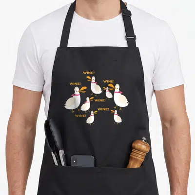 Tablier de cuisine noir avec sept mouettes blanches et des textes orange Wine Wine Wine Wine Seagull