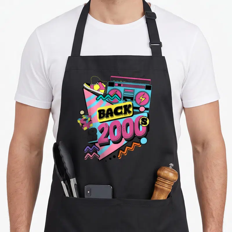 Tablier de cuisine noir avec illustration colorée Boombox sneaker et texte Back to the 2000s style années 90