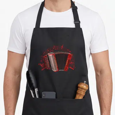 Tablier de cuisine noir avec illustration d'accordéon rouge et notes musicales en cercle.