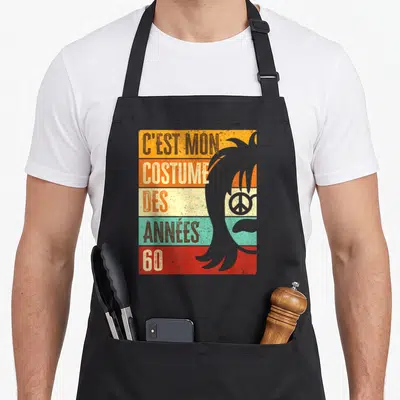 Tablier de cuisine noir avec illustration retro disco couleur et texte C'est mon costume des années 60