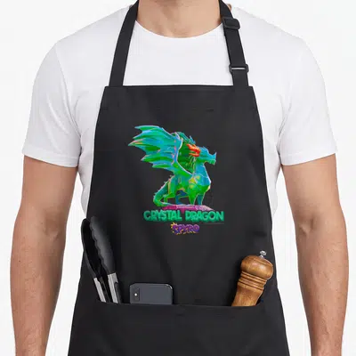 Tablier de cuisine noir avec un dragon vert cristal et l'inscription Crystal Dragon Spyro en lettres colorées.