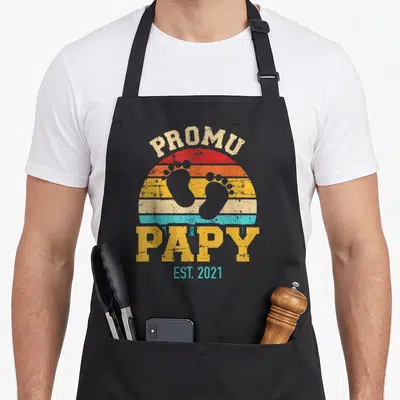 Tablier de cuisine noir avec motif Promu Papy Est 2021 et soleils colorés vintage