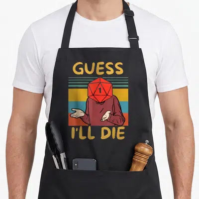 Tablier de cuisine noir avec illustrationGuess I'll Die et dé rouge sur fond rayé rétro.
