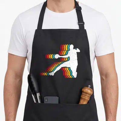 Tablier de cuisine noir avec silhouette handballeur et bandes ondulées multicolores style rétro.