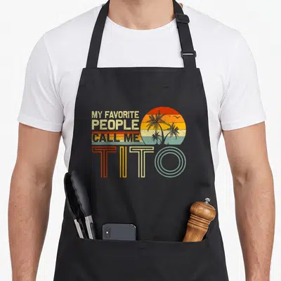 Tablier de cuisine noir avec motif vintage retro My favorite gens call me Tito et soleil aux palmiers