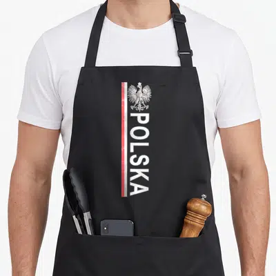 Tablier de cuisine noir avec inscription verticale POLSKA, aigle héraldique et bande rouge stylisée sur le côté gauche.