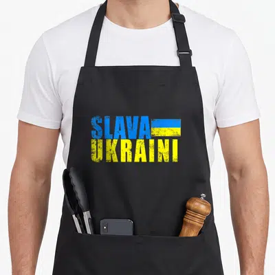 Tablier de cuisine noir avec inscription Slava Ukraini en bleu et jaune style rétro usé