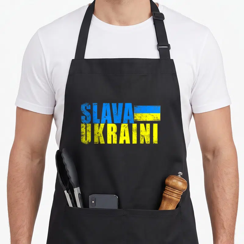 Tablier de cuisine noir avec inscription Slava Ukraini en bleu et jaune style rétro usé