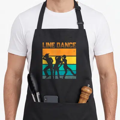 Tablier de cuisine noir avec illustration rétro de trois silhouettes dansant en ligne sur bandes orange jaune et turquoise.