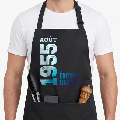 Tablier de cuisine noir avec le texte Août 1955 « Édition Limitée » en bleu dégradé et effet vieilli.