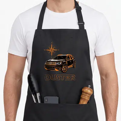 Tablier de cuisine noir avec illustration orange d'un SUV Duster et d'une boussole directionnelle.