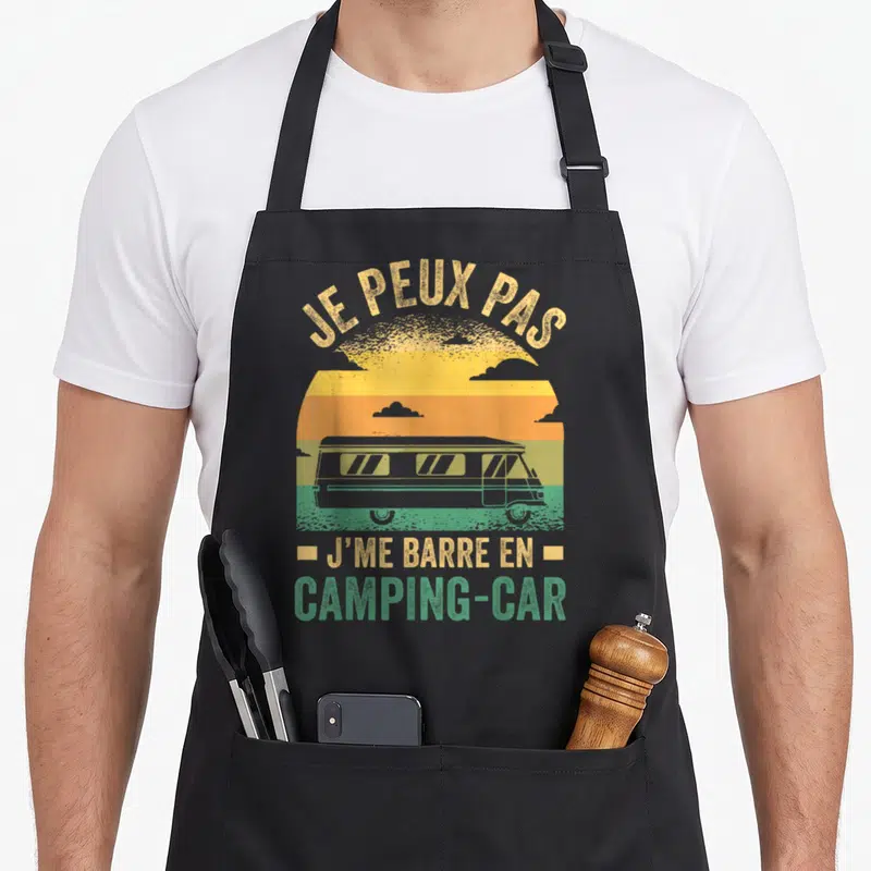 Tablier de cuisine noir avec illustration vintage d'un camping-car et texte Je peux pas j'me barre en camping-car campeur.