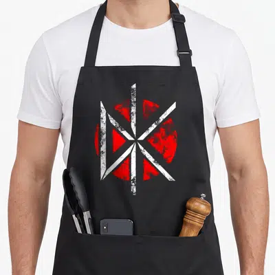 Tablier de cuisine noir avec un motif circulaire rouge et blanc aux lignes blanches croisées et effet granuleux.
