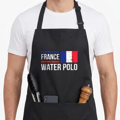 Tablier de cuisine noir avec un drapeau français et le texte France Water Polo en blanc délavé.