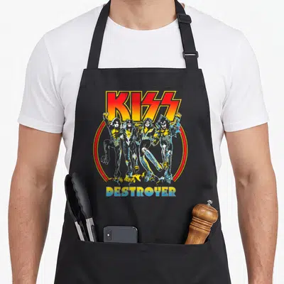 Tablier de cuisine noir avec illustration colorée du groupe KISS et le mot Destroyer en bas.