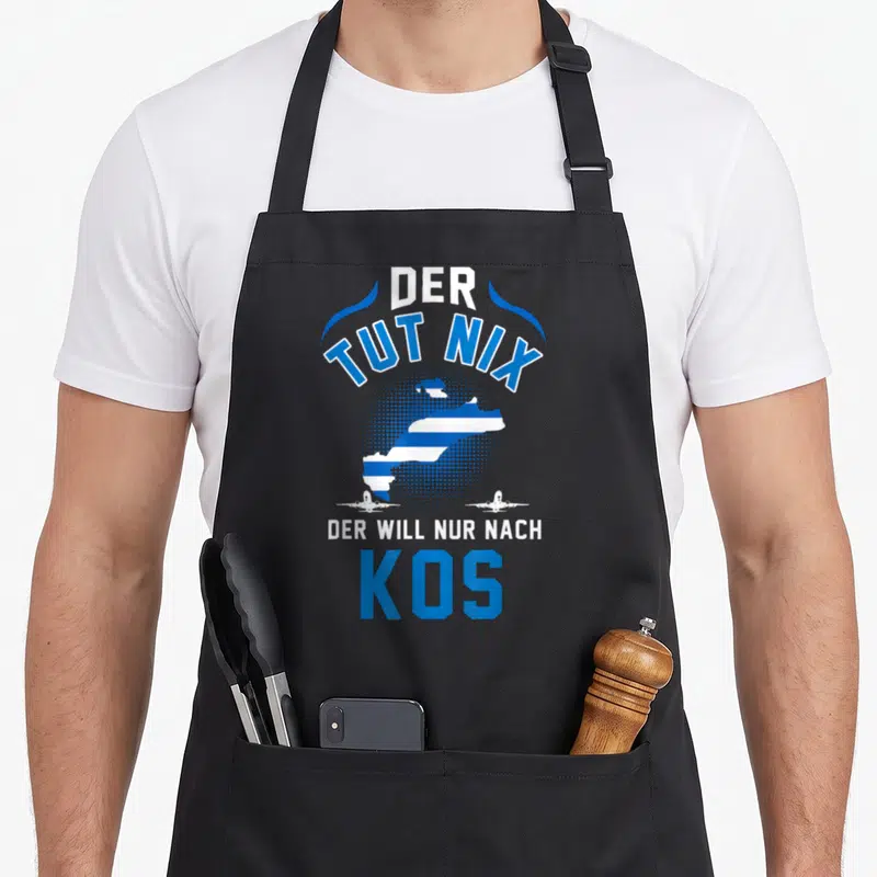 Tablier de cuisine noir avec inscription Der Tut Nix vers Kos et silhouette d'île bleue et blanche.