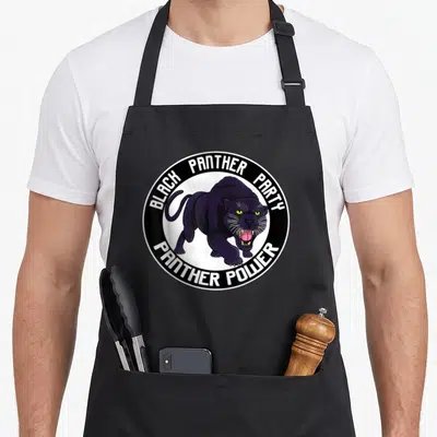 Tablier de cuisine noir avec un logo circulaire montrant une panthère noire et les mots Black Panther Party, Panther Power