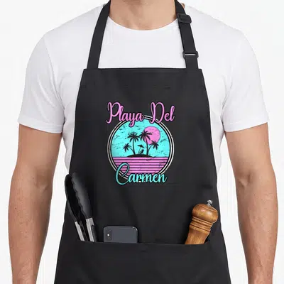 Tablier de cuisine noir avec motif circulaire Playa Del Carmen palmiers et soleil rose style vintage