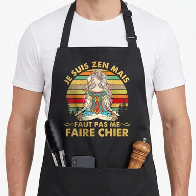 Tablier de cuisine noir avec une femme en tailleur