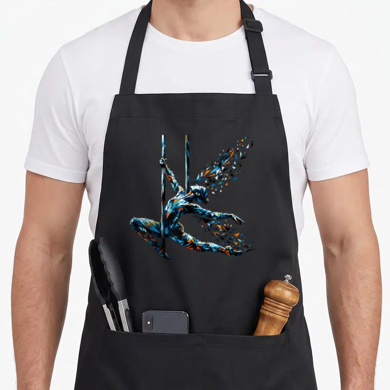 Tablier de cuisine noir avec illustration polygonale d'un acrobate suspendu aux ailes décomposées en triangles bleus et oranges.